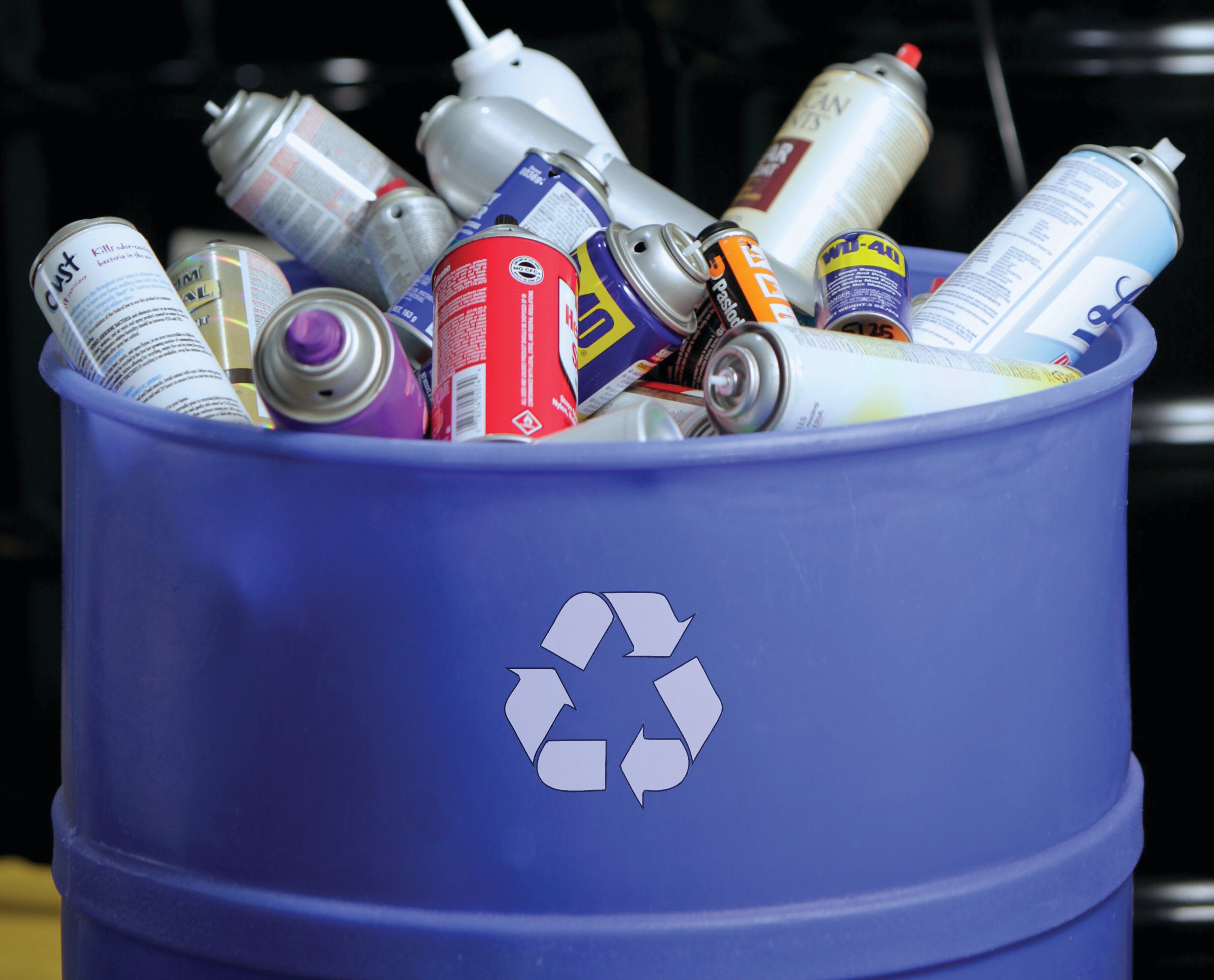Punctured aerosol cans are ready to be recycled