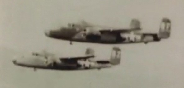 Historical WWII image of B-25J Mitchell flying in part of 3-ship formation on March 20, 1945
